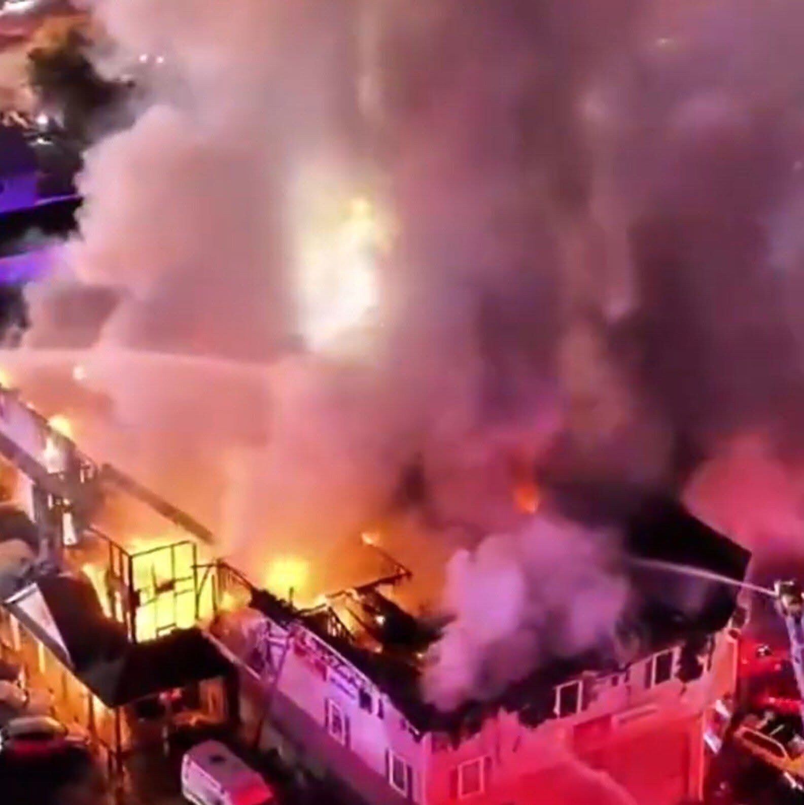 Breaking news as a massive fire erupts in Pamplona Alta, San Juan de Miraflores, Lima, racing through tightly packed homes, damaging or destroying up to three hundred houses, displacing hundreds of families, prompting emergency response, firefighting containment efforts, evacuation operations, humanitarian aid mobilization, and urgent safety warnings across the community.