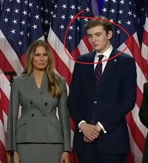 Standing in the Frame: A Moment of Public Life, Generations, and Quiet Symbolism